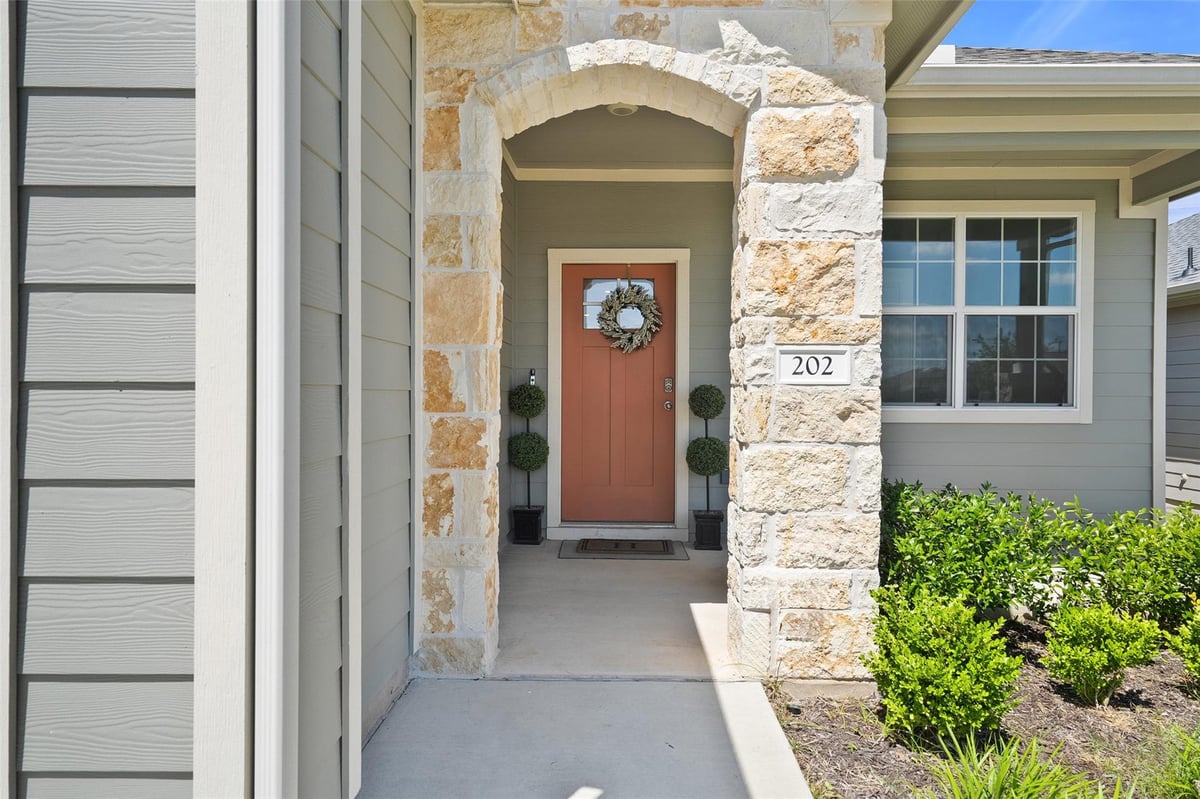 View 202 Barton Creek LN in Mustang Crk Ph 2 202 Barton Creek LN - front exterior - Luxury home in Mustang Crk Ph 2, Hutto, TX