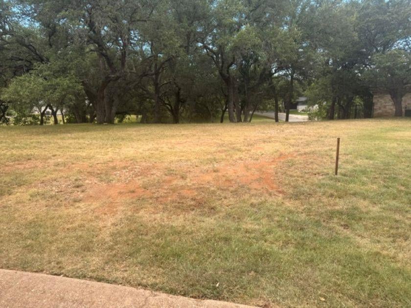 202 Creek LN - front exterior - Luxury lot in Pecan Creek, Horseshoe Bay, TX