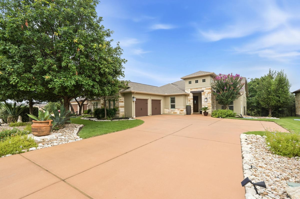 View 2021 Harvest Dance DR in Fairways At Crystal Falls Sec 2021 Harvest Dance DR - front exterior - Luxury home in Fairways At Crystal Falls Sec, Leander, TX
