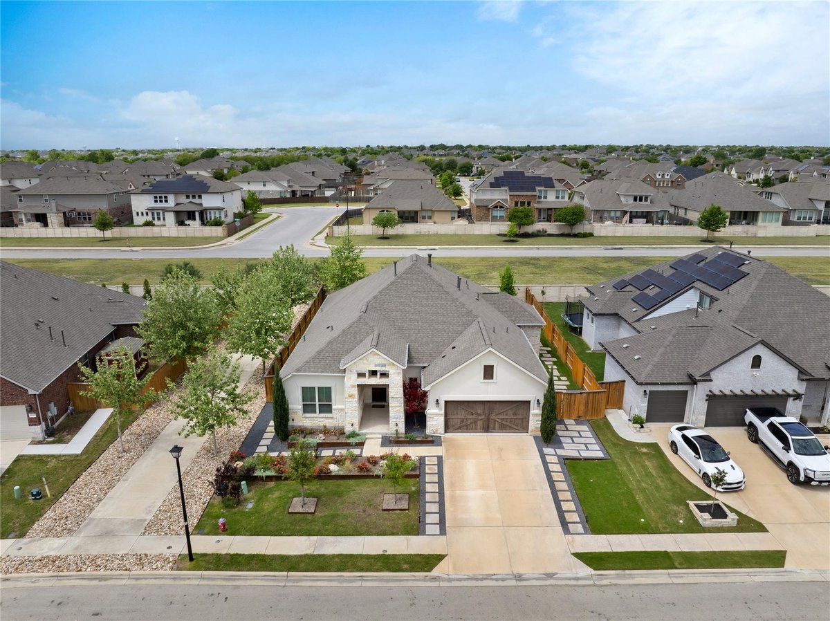 View 20216 Clare Island Bnd in Lakeside at Blackhawk III Ph 3 20216 Clare Island Bnd - front exterior - Luxury home in Lakeside at Blackhawk III Ph 3, Pflugerville, TX