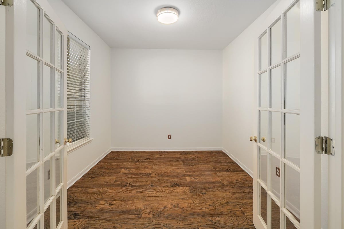 Primary bedroom at 2023 Wood Glen Dr - 4 bed 2 bath home