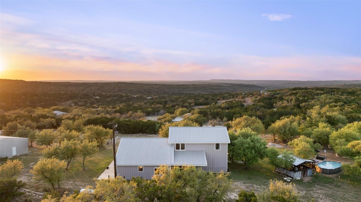 View 2025 Cripple Creek Stage Rd in Stagecoach Ranch Sec 03 2025 Cripple Creek Stage Rd - front exterior - Luxury home in Stagecoach Ranch Sec 03, Dripping Springs, TX