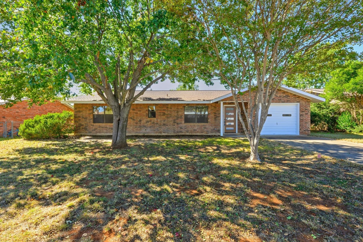 View 203 Broadmoor Dr in Sandcastle #3 203 Broadmoor Dr - front exterior - Luxury home in Sandcastle #3, Fredericksburg, TX