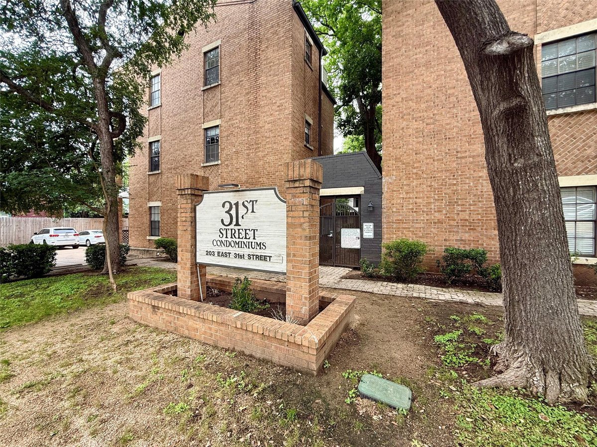 Kitchen at 203 E 31st St Unit #101 - 2 bed 2 bath home