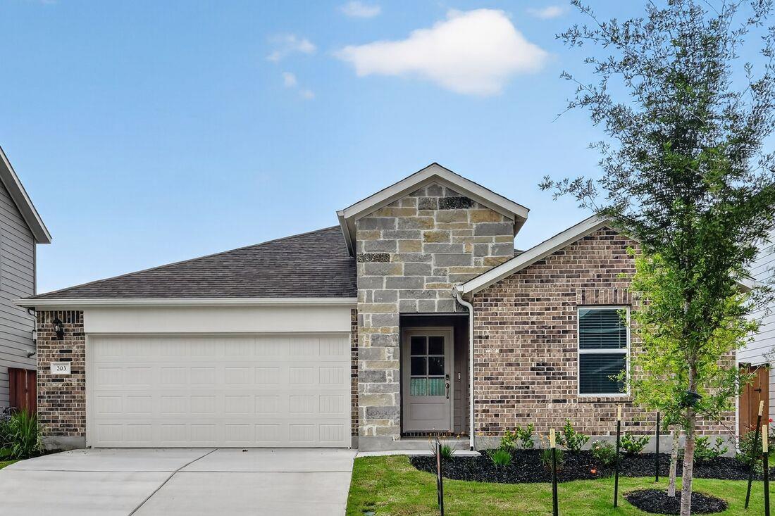 View 203 Makinaw Rd in Emory Crossing 203 Makinaw Rd - front exterior - Luxury home in Emory Crossing, Hutto, TX