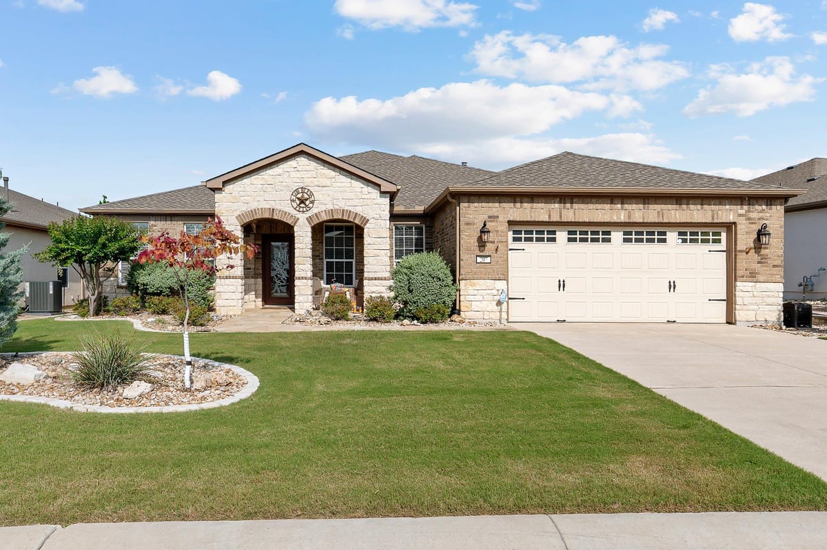 203 McKittrick Ridge RD - front exterior - Luxury home in Sun City, Georgetown, TX