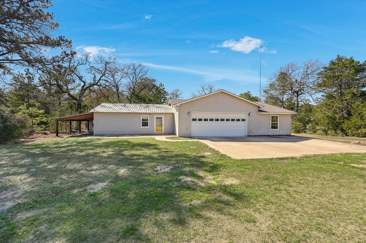 View 203 Pathfinders Way in Wilburn, Matilda 203 Pathfinders Way - front exterior - Luxury home in Wilburn, Matilda, Smithville, TX