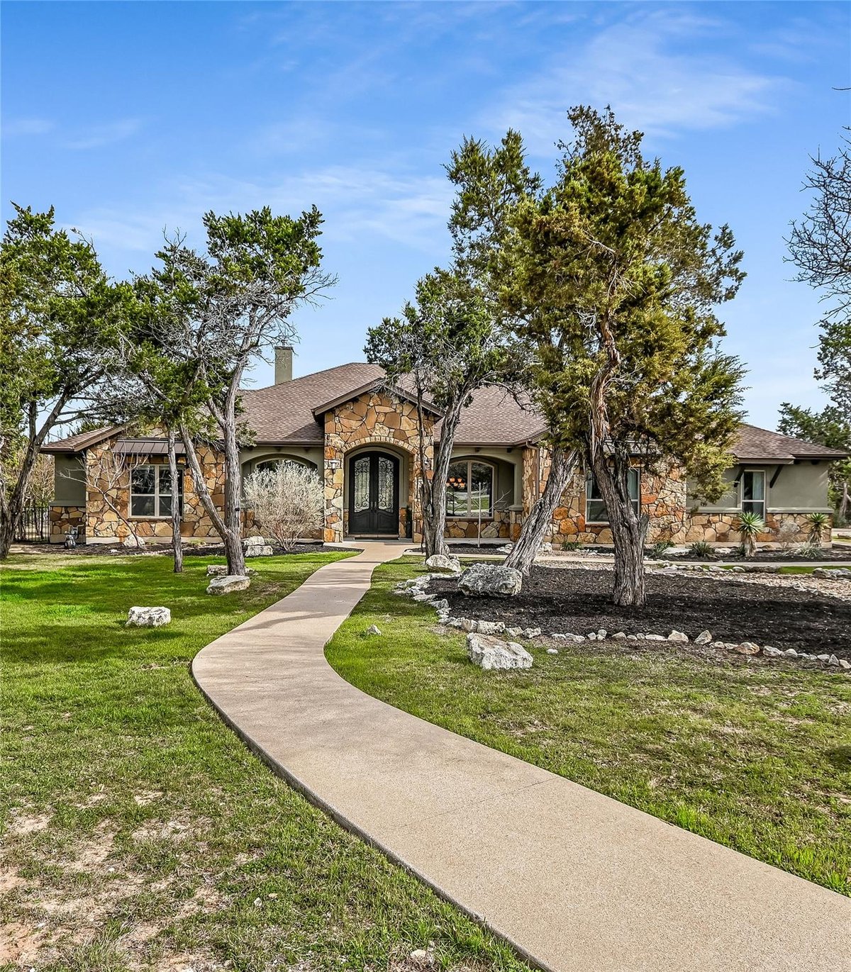 View 2030 Palos Verdes in Grand Mesa At Crystal Falls 2030 Palos Verdes - front exterior - Luxury home in Grand Mesa At Crystal Falls, Leander, TX