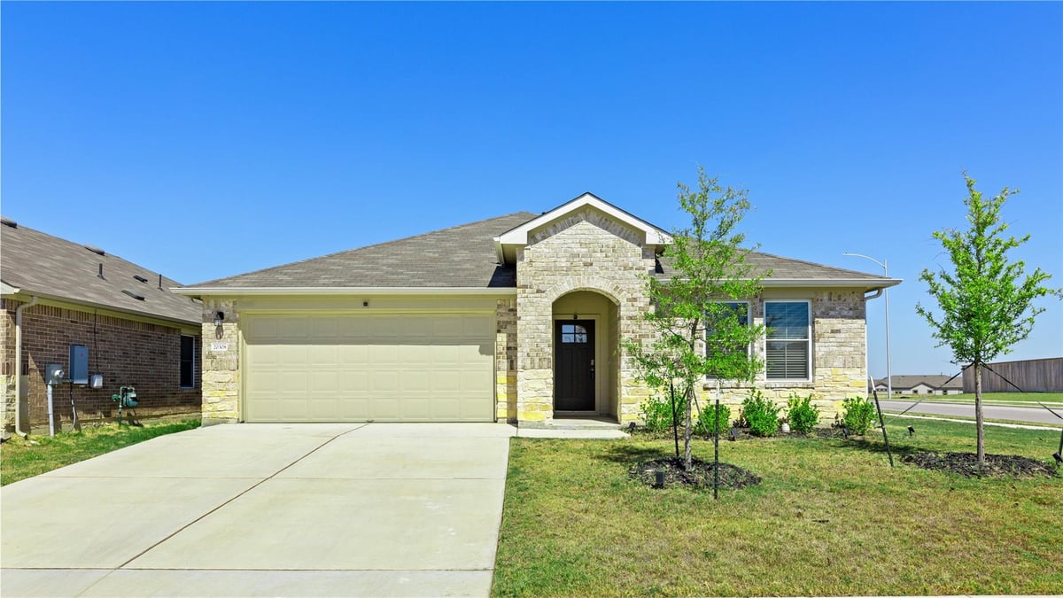 20308 Lone Peak PASS - property photo 1 - Luxury home in CARILLON, Manor, TX