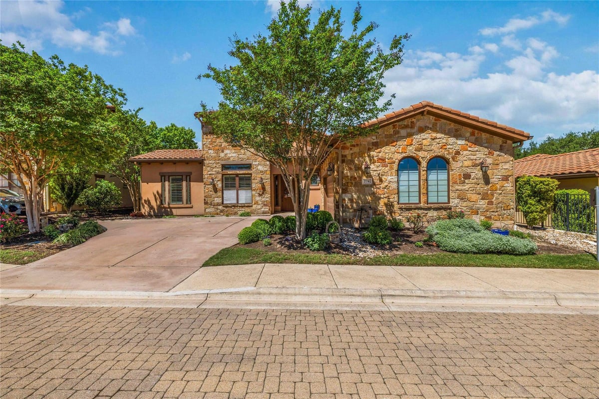 204 Belforte Ave - front exterior - Luxury home in Villas At Tuscan Village Amd, Austin, TX