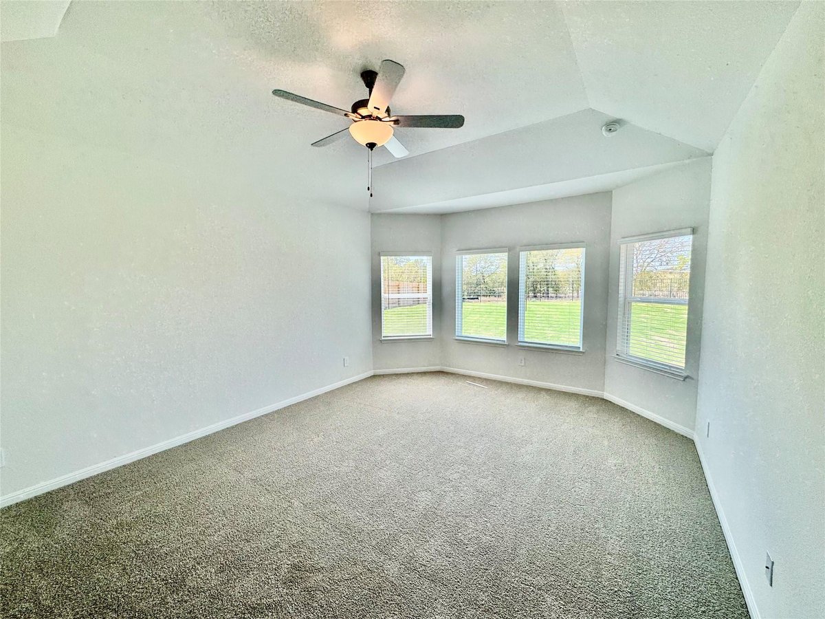Primary bedroom at 204 Coopers Hawk Crest - 5 bed 3 bath home
