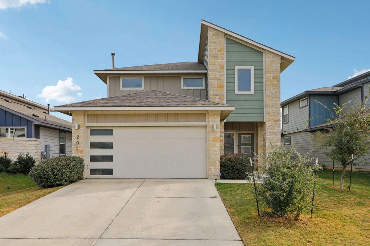 View 204 Cupreata Ln in WILDLEAF 204 Cupreata Ln - front exterior - Luxury home in WILDLEAF, Leander, TX