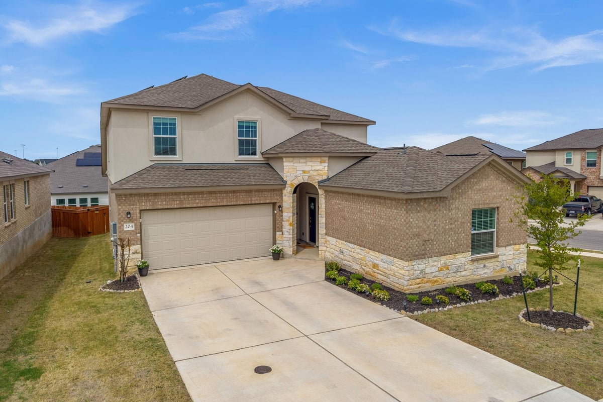 View 204 Lone Cedar Rd in Thunder Rock 204 Lone Cedar Rd - front exterior - Luxury home in Thunder Rock, Marble Falls, TX