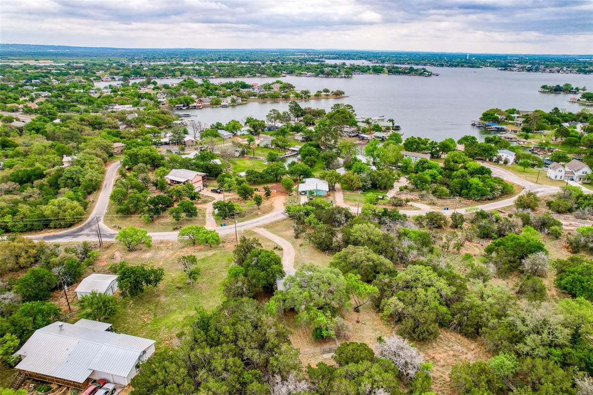 View 204 W Lakeshore Dr in Sunrise Beach 204 W Lakeshore Dr - front exterior - Luxury home in Sunrise Beach, Llano, TX