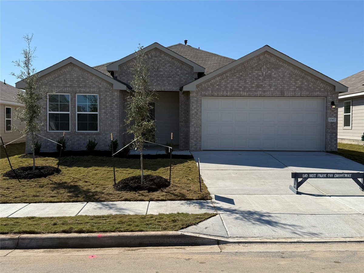 View 20400 Tuberville Ln in CARILLON 20400 Tuberville Ln - front exterior - Luxury home in CARILLON, Manor, TX