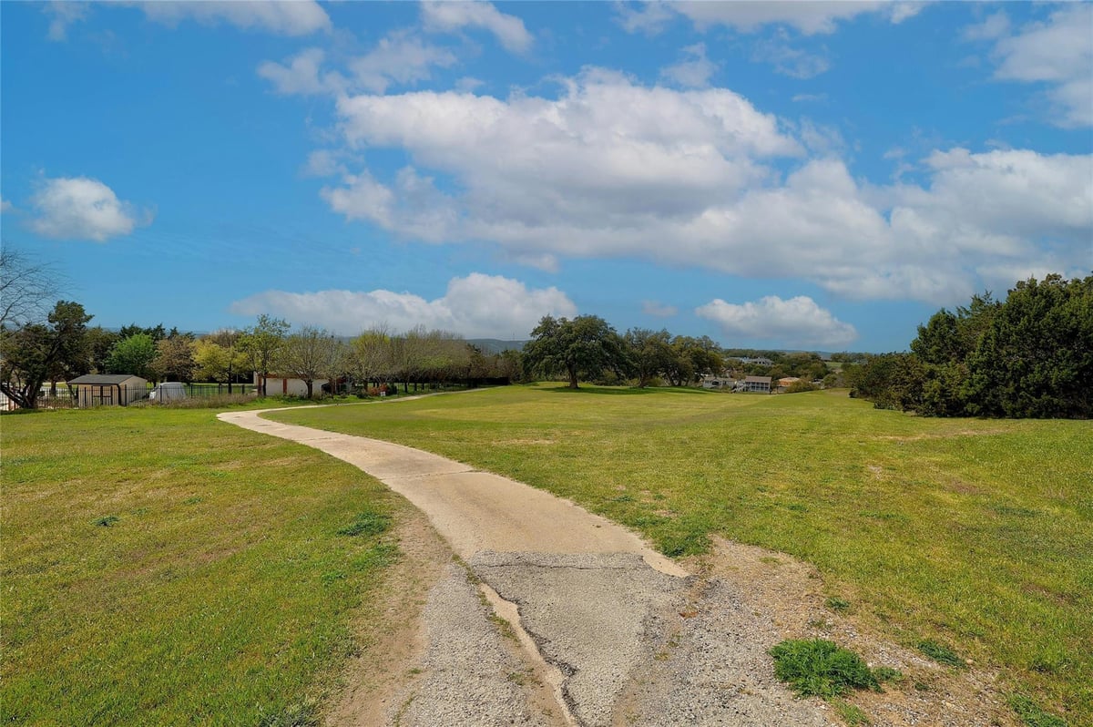 Primary bedroom at 20406 Earhart Ln - Highland Lake Estates Sec 05, Lago Vista, TX