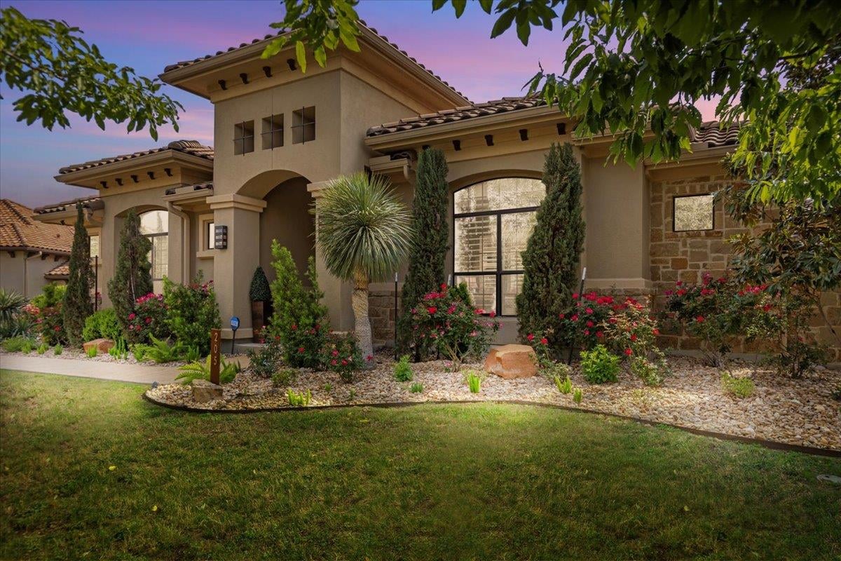View 205 Bisset CT in Rough Hollow Sec 1 Amdlt1-6,11 205 Bisset CT - front exterior - Luxury home in Rough Hollow Sec 1 Amdlt1-6,11, Austin, TX