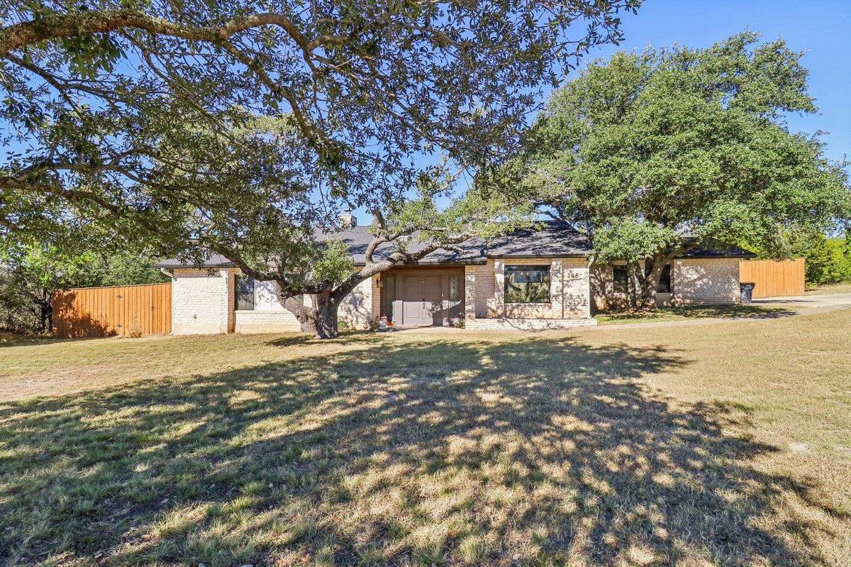 View 205 Northwood Hills Dr in NORTHWOOD HILLS 205 Northwood Hills Dr - front exterior - Luxury home in NORTHWOOD HILLS, Fredericksburg, TX