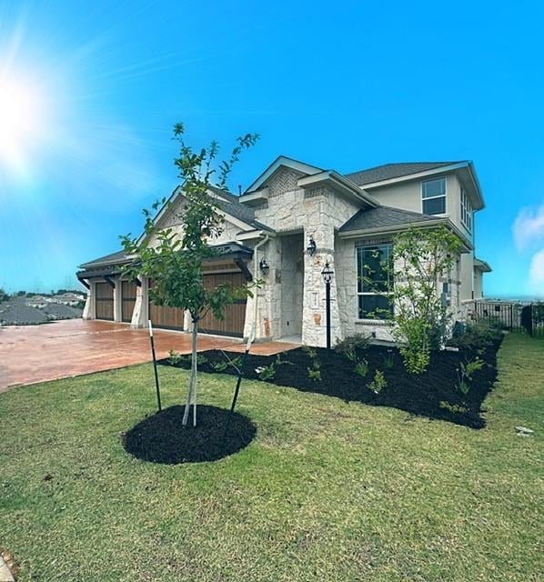 View 205 Olivia DR in Rough Hollow - The Vineyards 205 Olivia DR - front exterior - Luxury home in Rough Hollow - The Vineyards, Austin, TX