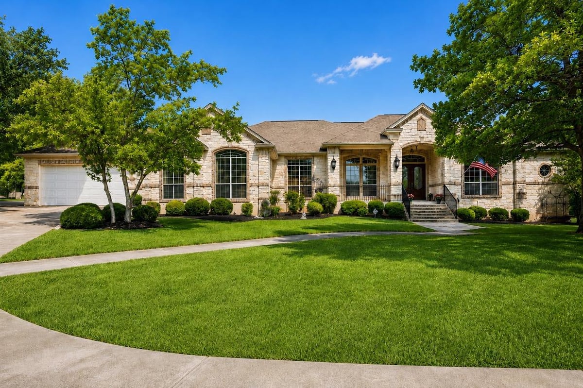 View 205 W Majestic Oak LN in Woodland Park Ph 1 205 W Majestic Oak LN - front exterior - Luxury home in Woodland Park Ph 1, Georgetown, TX