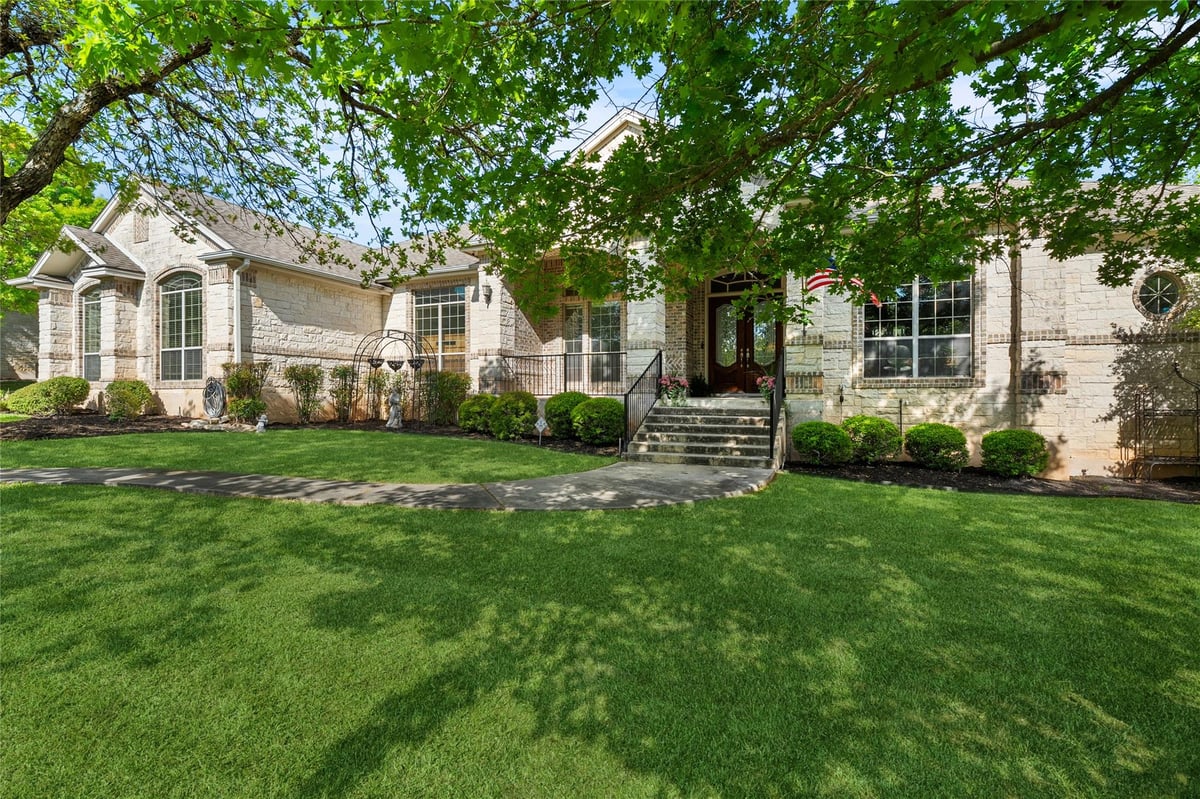 View 205 W Majestic Oak Ln in Woodland Park Ph 1 205 W Majestic Oak Ln - front exterior - Luxury home in Woodland Park Ph 1, Georgetown, TX