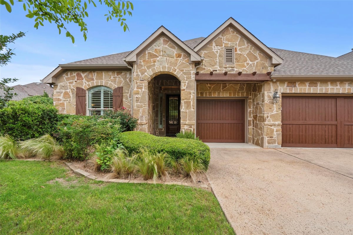 View 205 Wester Ross LN in Rough Hollow 205 Wester Ross LN - front exterior - Luxury home in Rough Hollow, Austin, TX