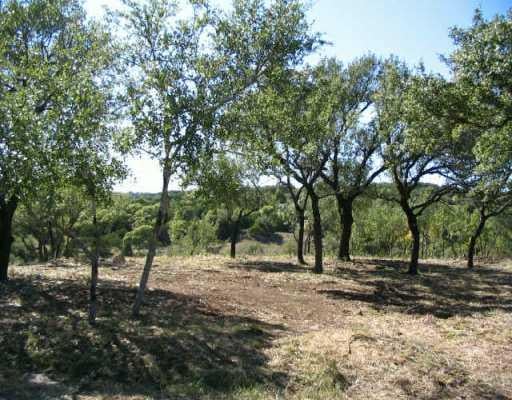 View 20501 Auger LN 20501 Auger LN - front exterior - Luxury lot in Spicewood, TX