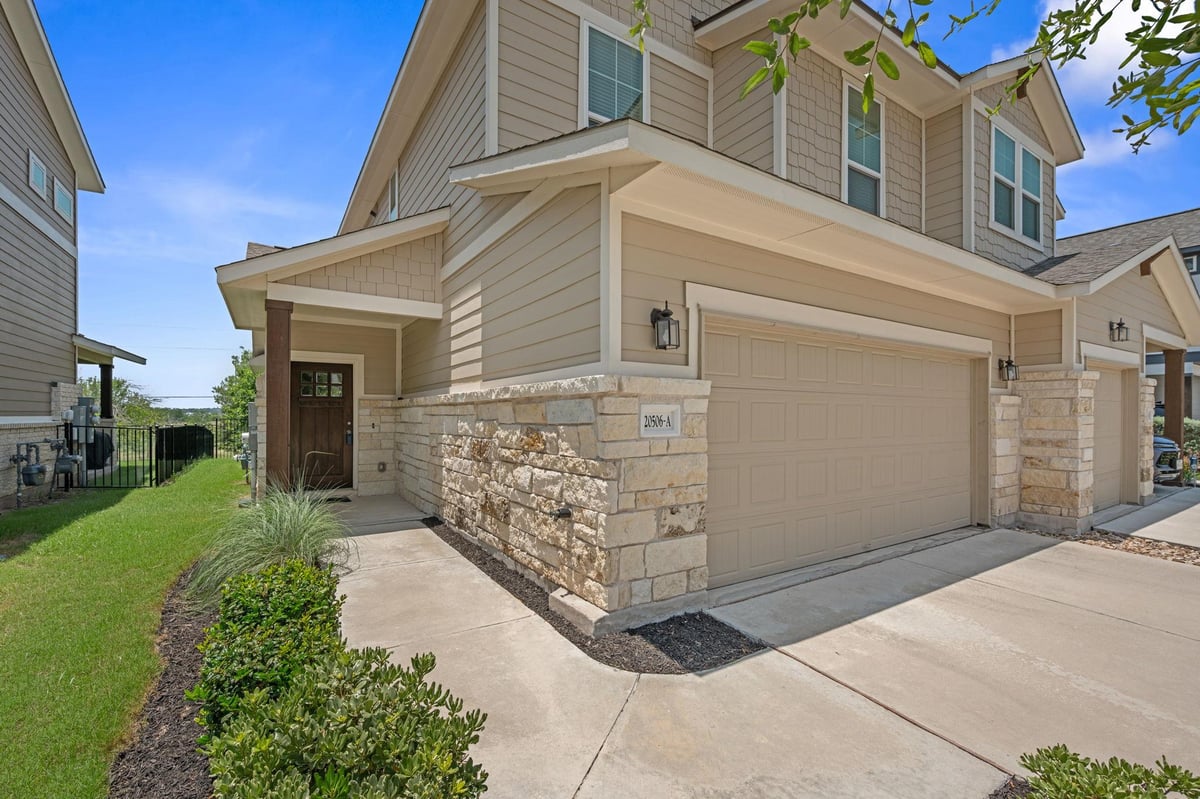 View 20506 Tractor DR Unit #A in Villas At Rowe 20506 Tractor DR Unit #A - front exterior - Luxury home in Villas At Rowe, Pflugerville, TX