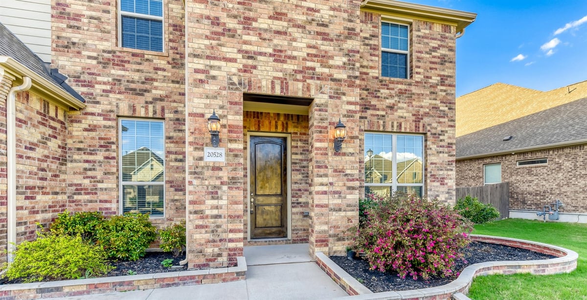 View 20528 Woodvine Ave in Park at Blackhawk and Lakeside 20528 Woodvine Ave - front exterior - Luxury home in Park at Blackhawk and Lakeside, Pflugerville, TX