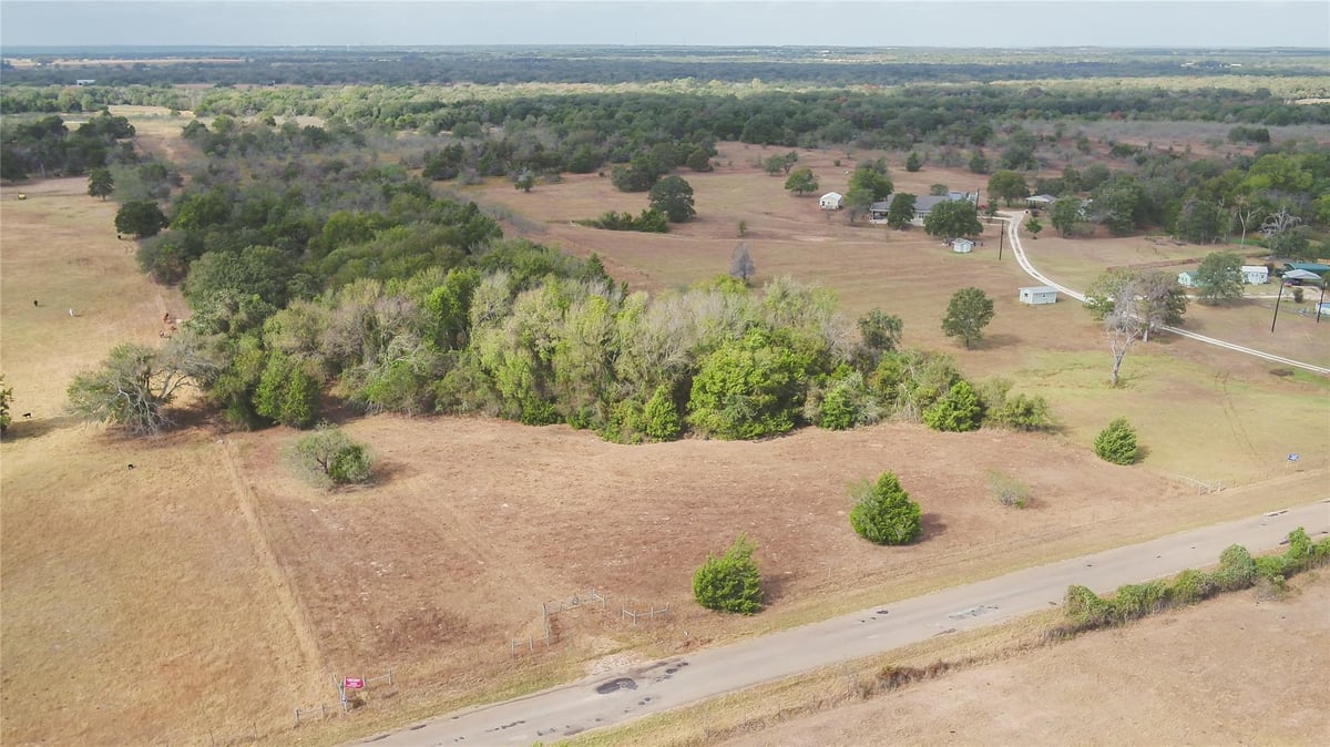 View 2054 County Road 334 2054 County Road 334 - front exterior - Luxury home in Rockdale, TX