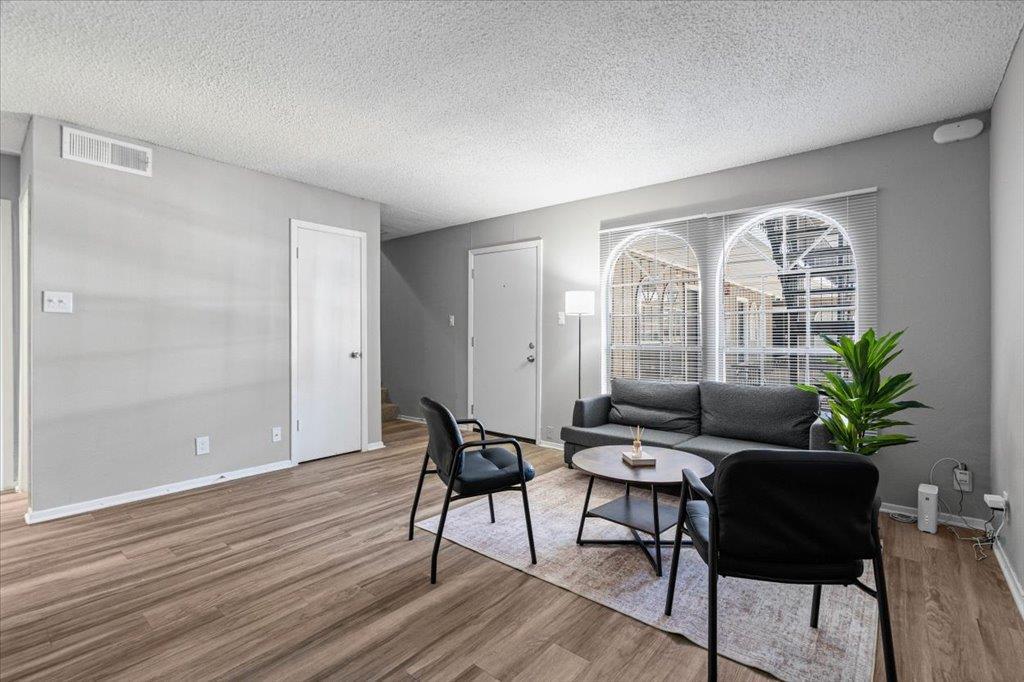 Living area - 101 E 33rd St Unit #206 Living area at 101 E 33rd St Unit #206 - 3 bed 2 bath home