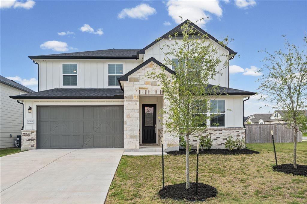 View 20601 Stelfox ST in Manor Heights Ph 2 Sec 1A 20601 Stelfox ST - front exterior - Luxury home in Manor Heights Ph 2 Sec 1A, Manor, TX