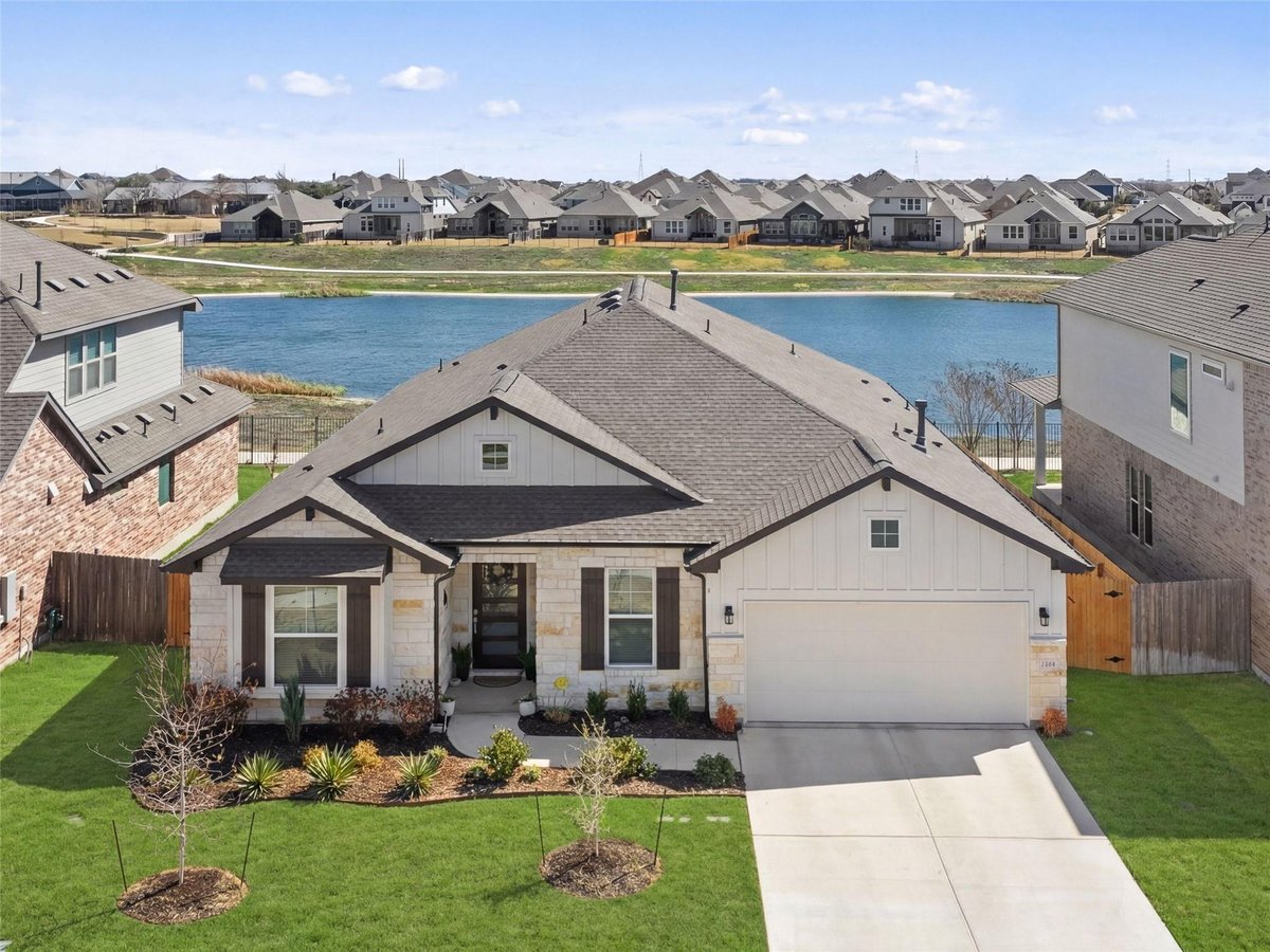 View 20608 Carries Ranch Rd in Park At Blackhawk 4 20608 Carries Ranch Rd - front exterior - Luxury home in Park At Blackhawk 4, Pflugerville, TX