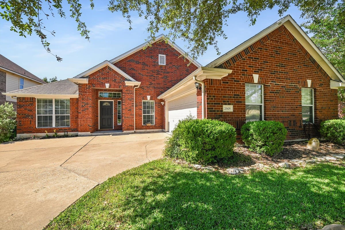 View 20609 Kearney Hill RD in Meadows Blackhawk Ph 05 20609 Kearney Hill RD - front exterior - Luxury home in Meadows Blackhawk Ph 05, Pflugerville, TX