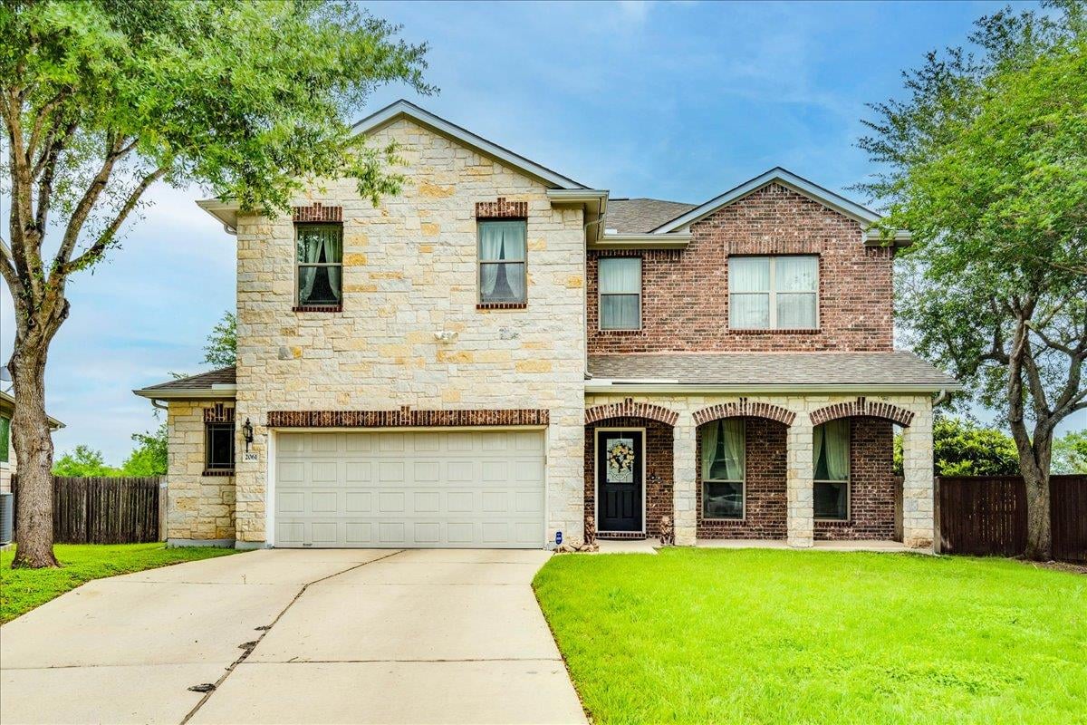 View 2061 Genesta Dr in Meadow Park Sec 2 2061 Genesta Dr - front exterior - Luxury home in Meadow Park Sec 2, Buda, TX