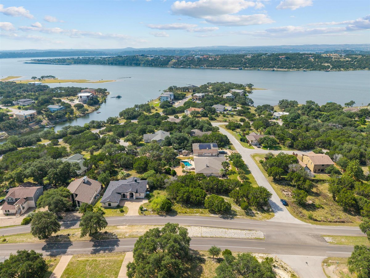 View 20635 Highland Lake DR in Highland Lake Estates Sec 18 20635 Highland Lake DR - front exterior - Luxury lot in Highland Lake Estates Sec 18, Lago Vista, TX