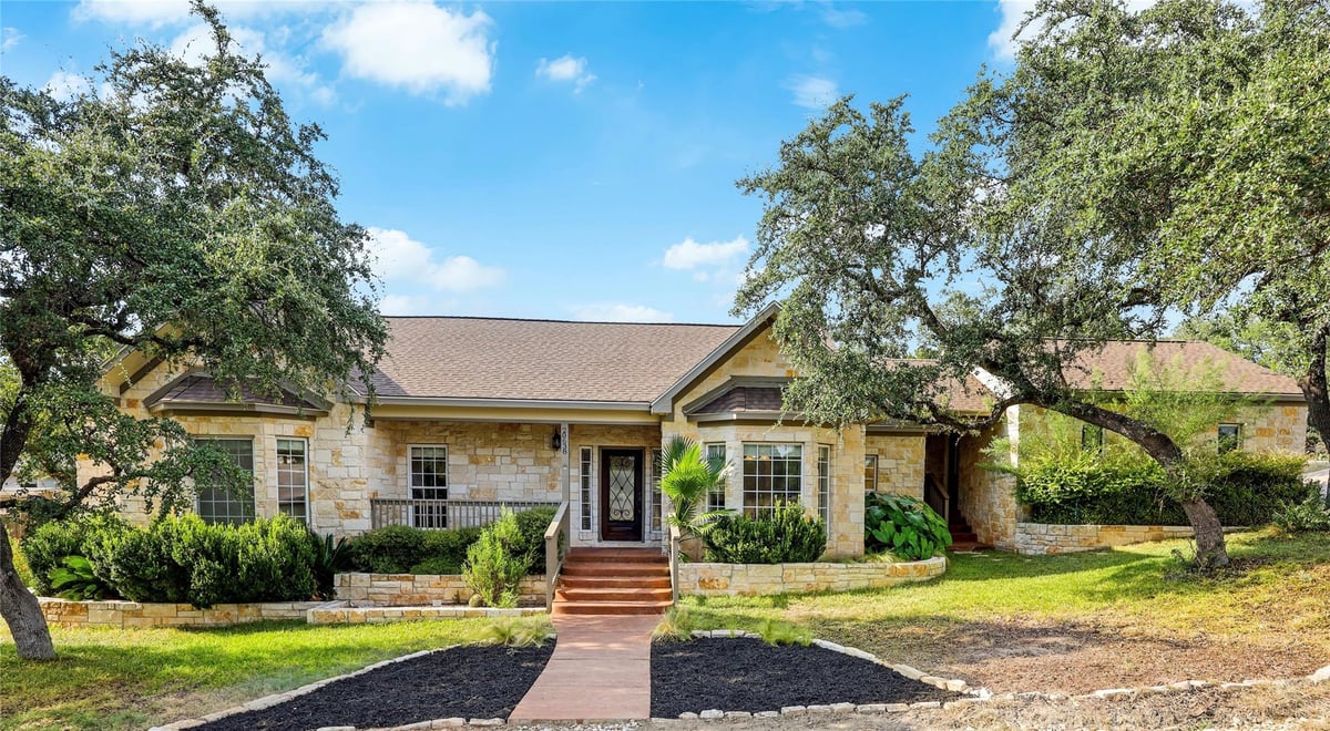 View 20638 Highland Lake Dr in Highland Lake Estates Sec 18 20638 Highland Lake Dr - front exterior - Luxury home in Highland Lake Estates Sec 18, Lago Vista, TX