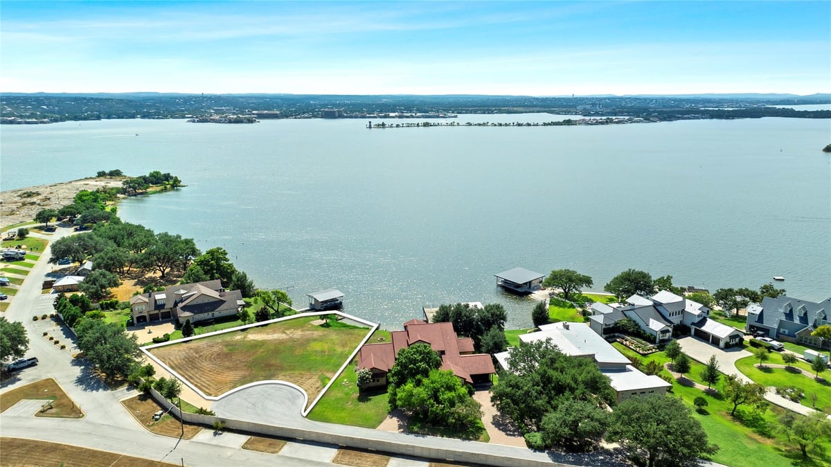 View 207 Wilderness Dr E in Wilderness Cove 207 Wilderness Dr E - front exterior - Luxury lot in Wilderness Cove, Marble Falls, TX