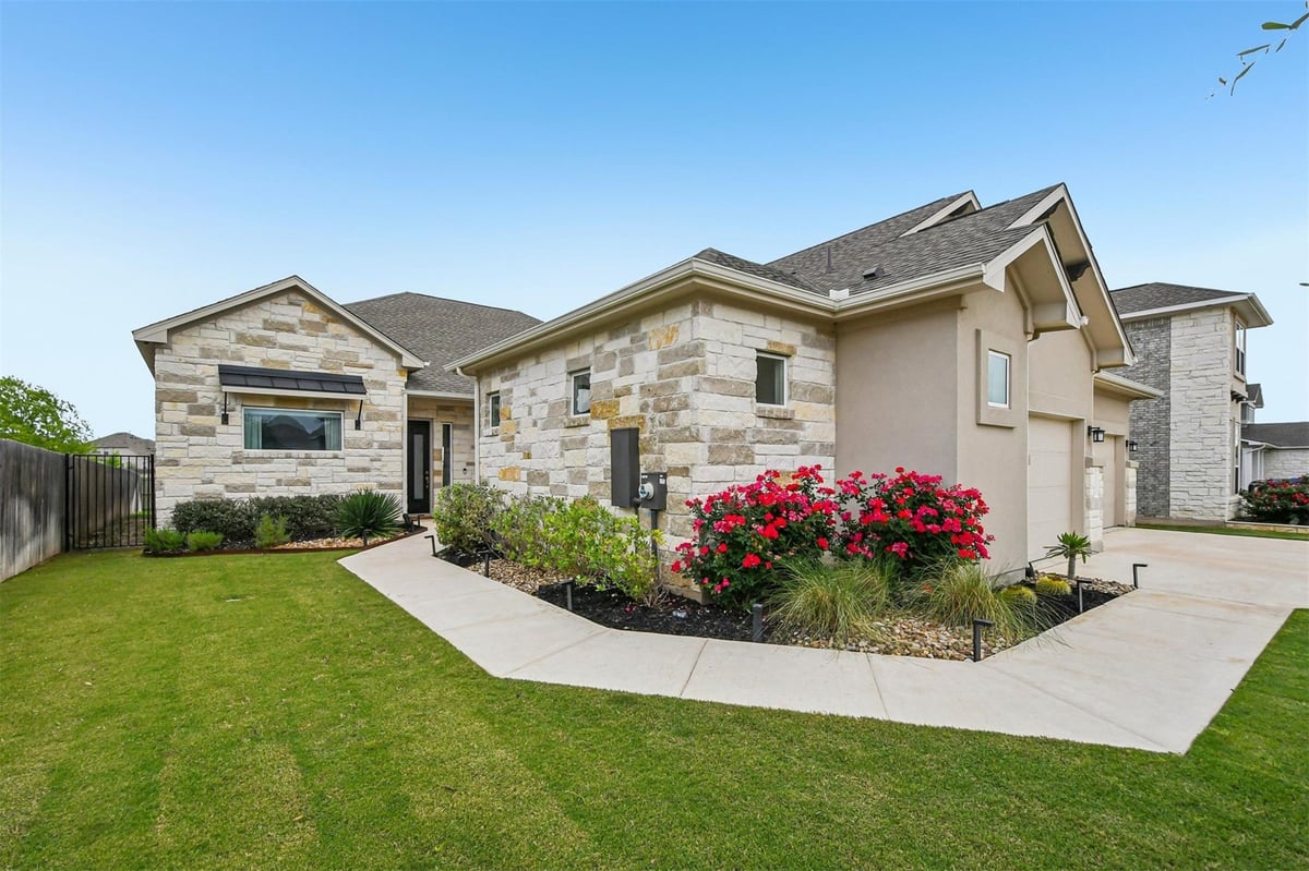 View 208 Great Lawn Bnd in Santa Rita Ranch Ph 3 Sec 1 208 Great Lawn Bnd - front exterior - Luxury home in Santa Rita Ranch Ph 3 Sec 1, Liberty Hill, TX