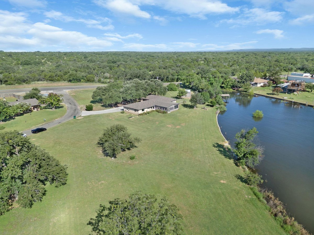 View 208 Iris LN in Floyd Acres 208 Iris LN - front exterior - Luxury home in Floyd Acres, Buchanan Dam, TX