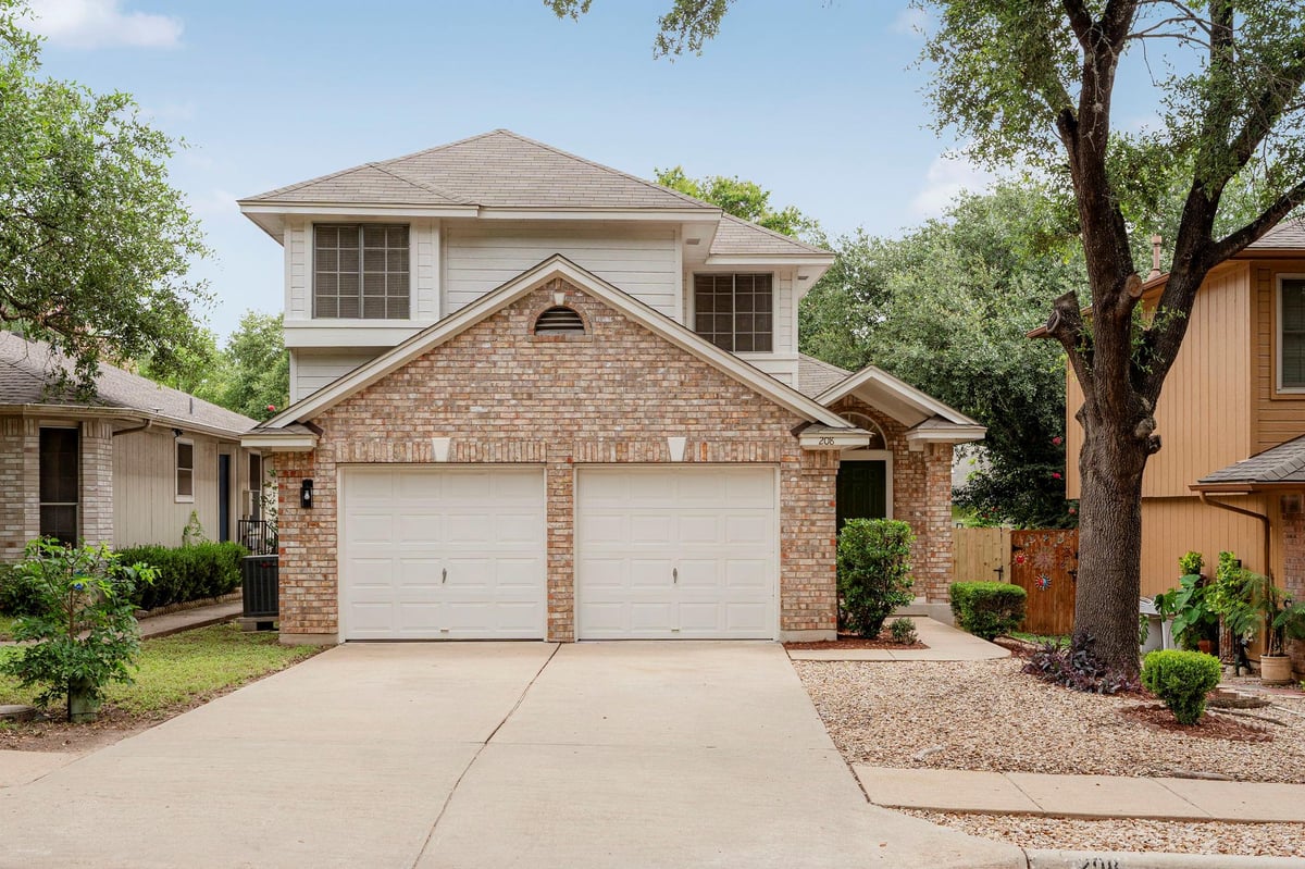 View 208 Natali ST in Park Ridge 208 Natali ST - front exterior - Luxury home in Park Ridge, Austin, TX