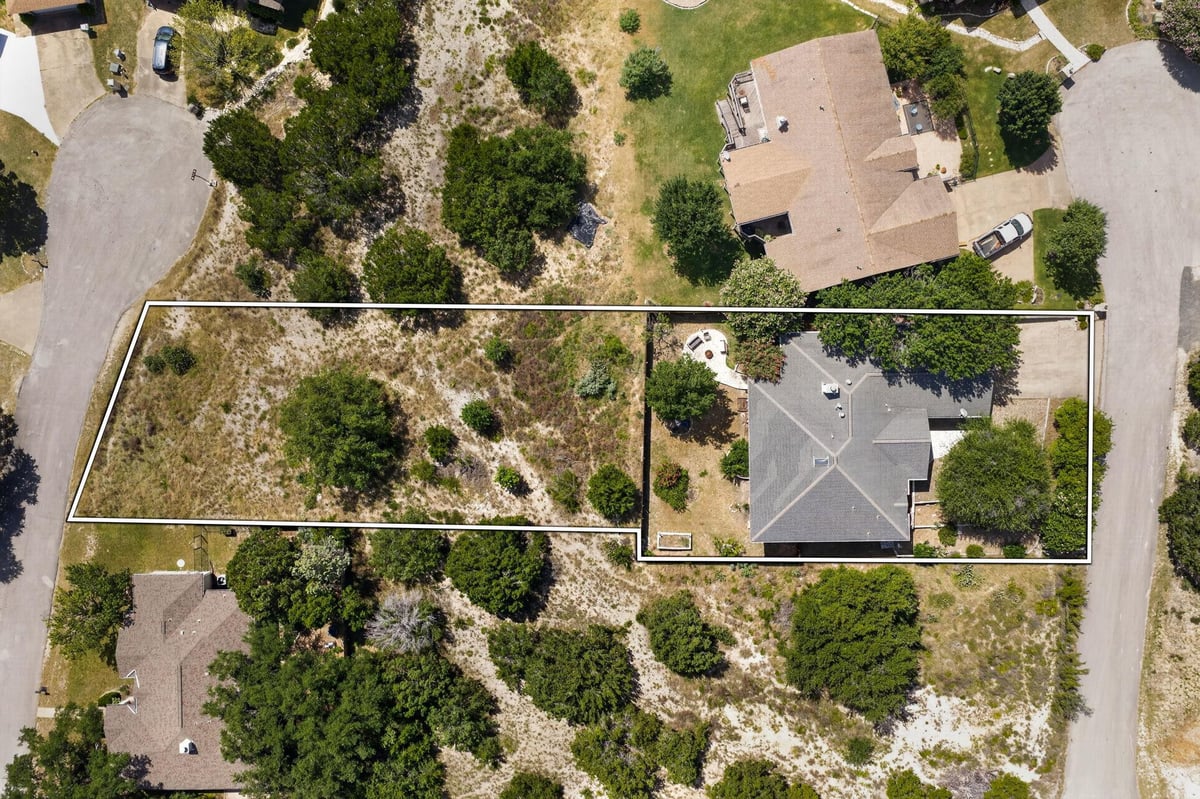 View 20802 Madison CV in Highland Lake Estates Sec 15 20802 Madison CV - front exterior - Luxury lot in Highland Lake Estates Sec 15, Lago Vista, TX
