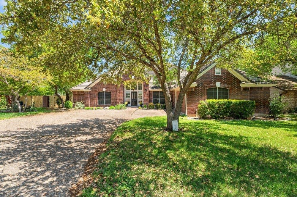 209 El Rio Dr - front exterior - Luxury home in Lakeway Sec 26, Lakeway, TX