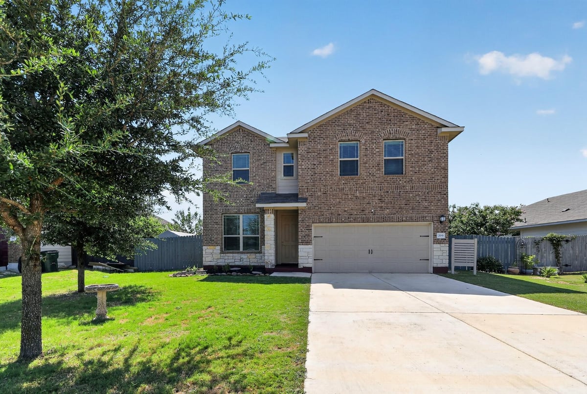 View 209 Evening Dusk DR in Woodlands Park 209 Evening Dusk DR - property photo 1 - Luxury home in Woodlands Park, Kyle, TX