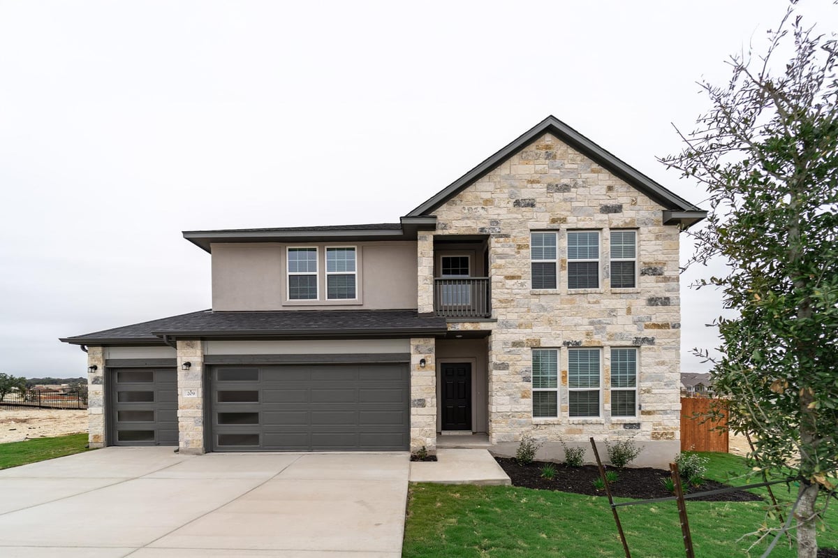 View 209 Joy Ln in Lariat 209 Joy Ln - front exterior - Luxury home in Lariat, Liberty Hill, TX