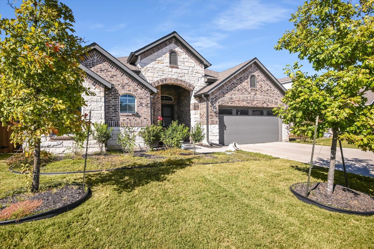 View 20908 Claire Jean PATH in PARK AT BLACKHAWK 20908 Claire Jean PATH - front exterior - Luxury home in PARK AT BLACKHAWK, Pflugerville, TX
