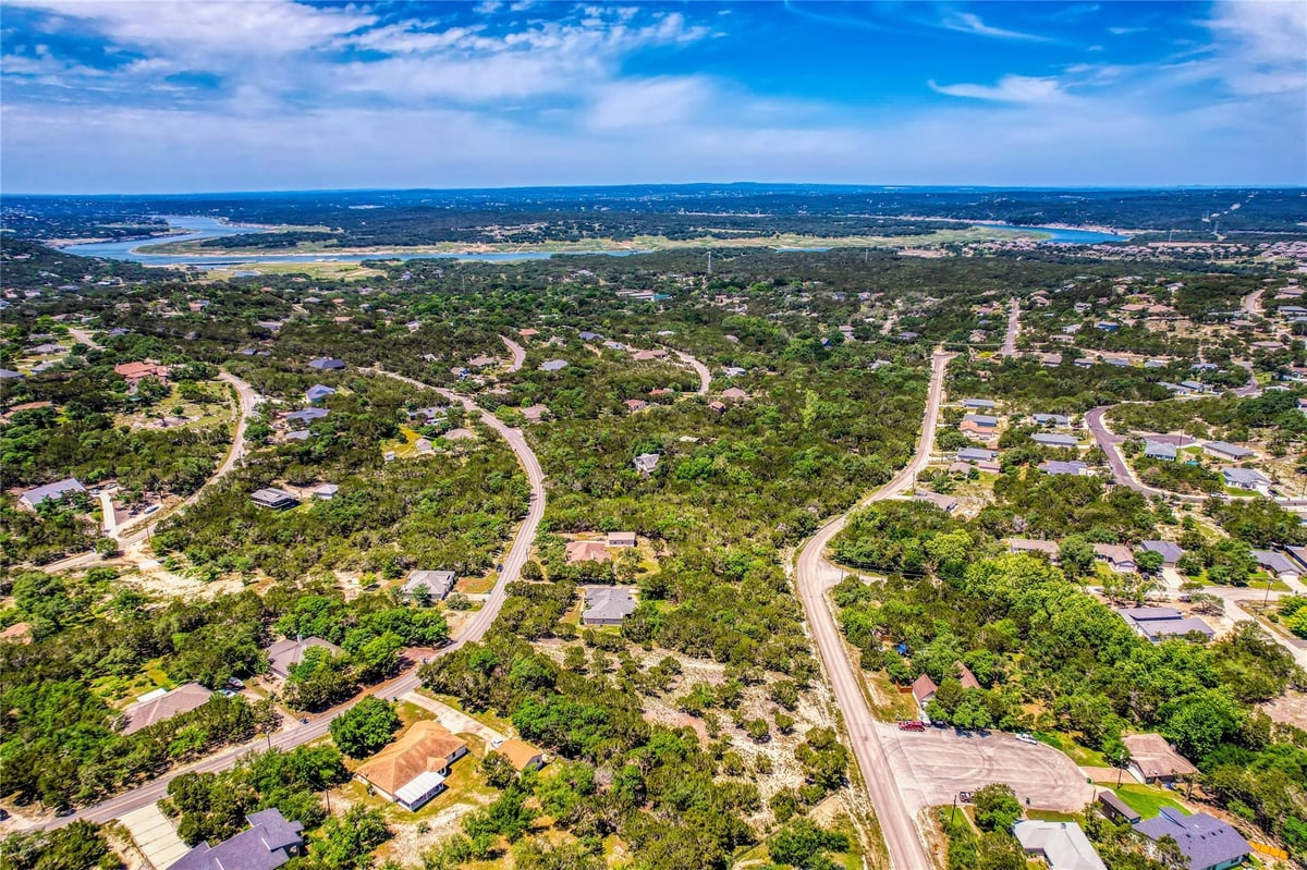View 20908 Northland DR in Lago Vista Estates 20908 Northland DR - front exterior - Luxury lot in Lago Vista Estates, Lago Vista, TX