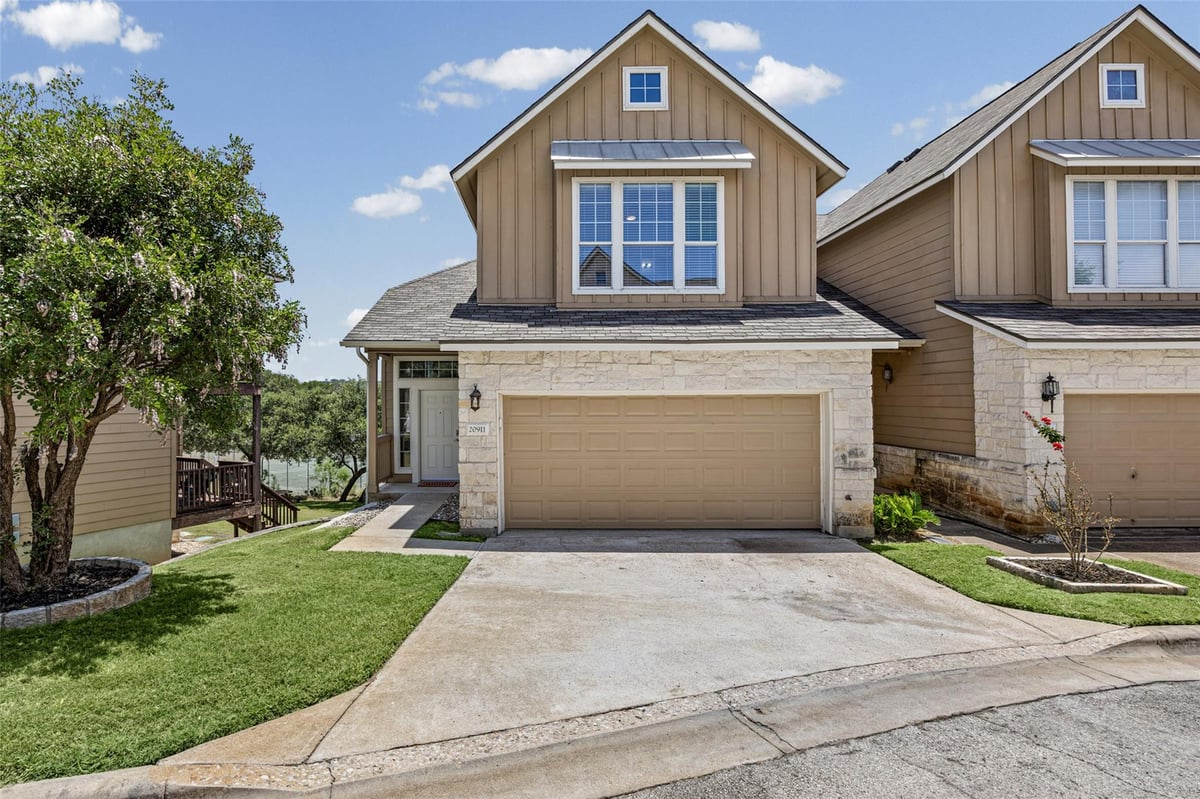 View 20911 Waterside DR Unit #9 in Waterside Oaks Condo Amd 20911 Waterside DR Unit #9 - property photo 1 - Luxury home in Waterside Oaks Condo Amd, Lago Vista, TX
