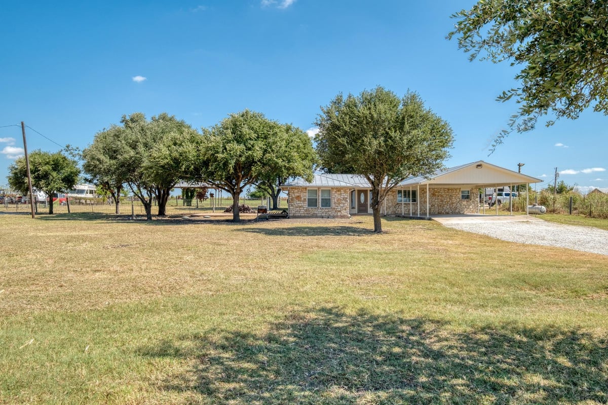 View 20960 Cameron RD in McShepherd Ranches Brushy Cree 20960 Cameron RD - property photo 1 - Luxury home in McShepherd Ranches Brushy Cree, Coupland, TX