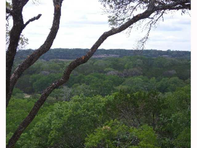 View 21.83 acres Tract BC Fischer Store RD 21.83 acres Tract BC Fischer Store RD - property photo 1 - Luxury home in Wimberley, TX